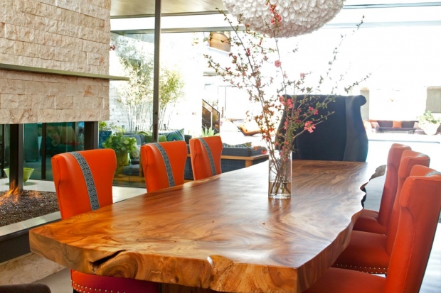 http://www.californiahomedesign.com/blog/2012/10/19/function-be-damned-live-edge-dining-tables